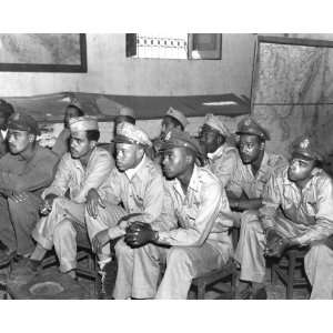 332nd Fighter Group (Tuskegee airmen) pilots give full attention 1943 