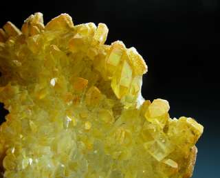 Bright yellow coated quartz cluster  