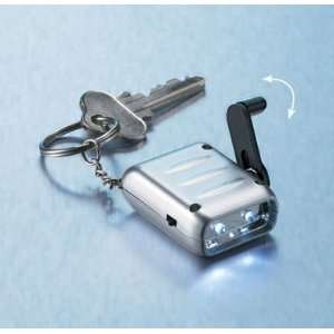  Avon Silver Keychain With Hand Crank Flashlight