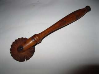 19th century antique kitchen dough cutter made of wood