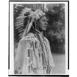  Youth in holiday costume,Umatilla Indian youth,feather 