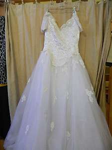 White satin and tulle beaded wedding dress  