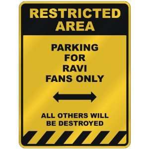  RESTRICTED AREA  PARKING FOR RAVI FANS ONLY  PARKING 