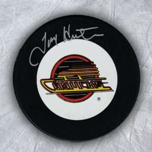  TIM HUNTER Vancouver Canucks SIGNED Hockey PUCK: Sports 