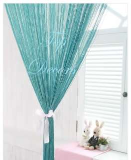 Grade B Teal/Aqua colour string curtain captured above heavily 