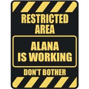   RESTRICTED AREA ALANA IS WORKING  PARKING SIGN