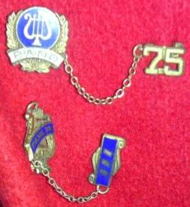   Ca. 1975 varsity letterman jacket. band tennis, leather sleeve  