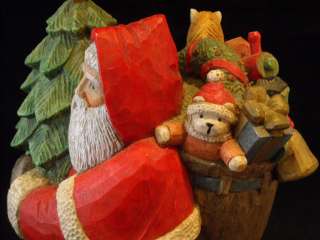 Cast Resin Santa with tree and a Sack of Toys  