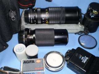 Minolta Camera X 570 with Many Lenses and Accessories  