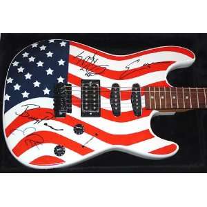 LYNYRD SKYNYRD Autographed USA FLAG Signed Guitar