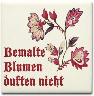 This beautiful ceramic tile coaster features an old German folk 