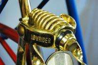 Deluxe Lowrider bicycle collectible gold cruiser banana seat red 